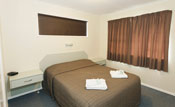 Relaxing queen bed in your Motueka accommodation